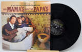 Vinyl record album 'The Mama's and the Papa's' by Brunswick, shown with the printed cover on the left and the black LP record partially visible on the right against a light gray background.