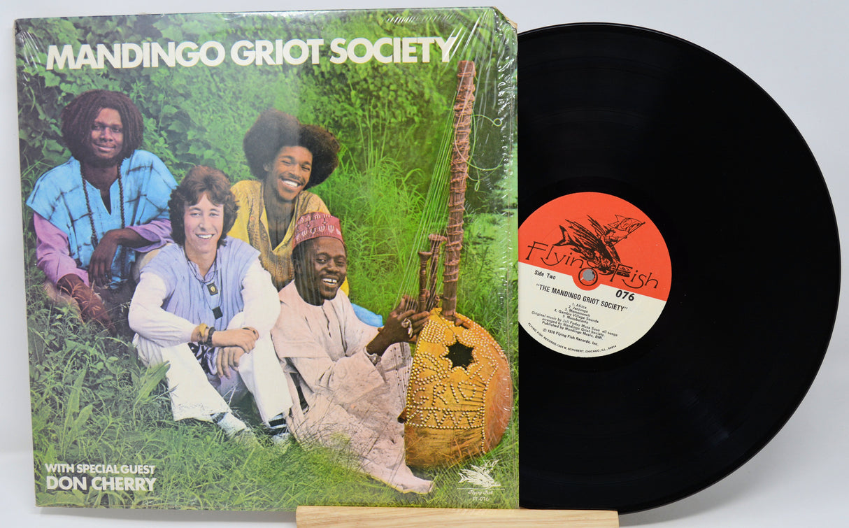 Vinyl record with cover featuring 'Mandingo Griot Society' and 'Don Cherry'.