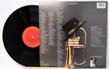 Vinyl record with a trumpet illustration on the cover