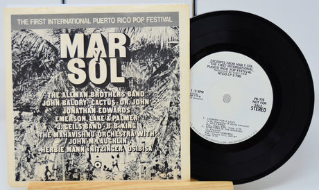 Back cover and record of Mar Y Sol Puerto Rico Pop Festival Atco Sampler vinyl EP highlighting festival artists in monochrome art.