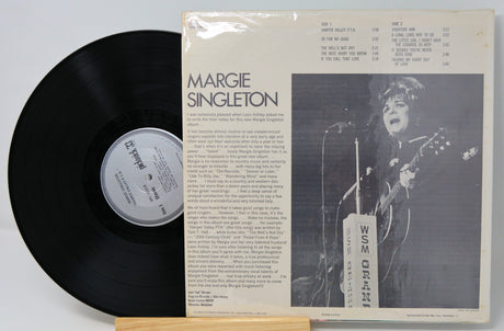 Back cover of Margie Singleton's Harper Valley P.T.A. vinyl album with black vinyl record and liner notes