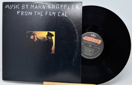 Vinyl record with cover featuring 'Music by Mark Knopfler from the film EAL' on a light gray background