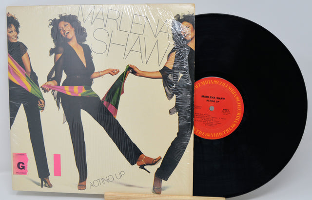 Vinyl record with cover featuring a dancer and text 'Marlena Shaw Acting Up'.