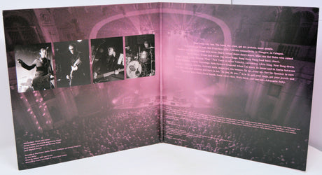 Album cover with black and white photos of a band on the left and text on the right, with a pink overlay.