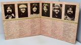 Foldout album cover with black and white portraits and text on a light background