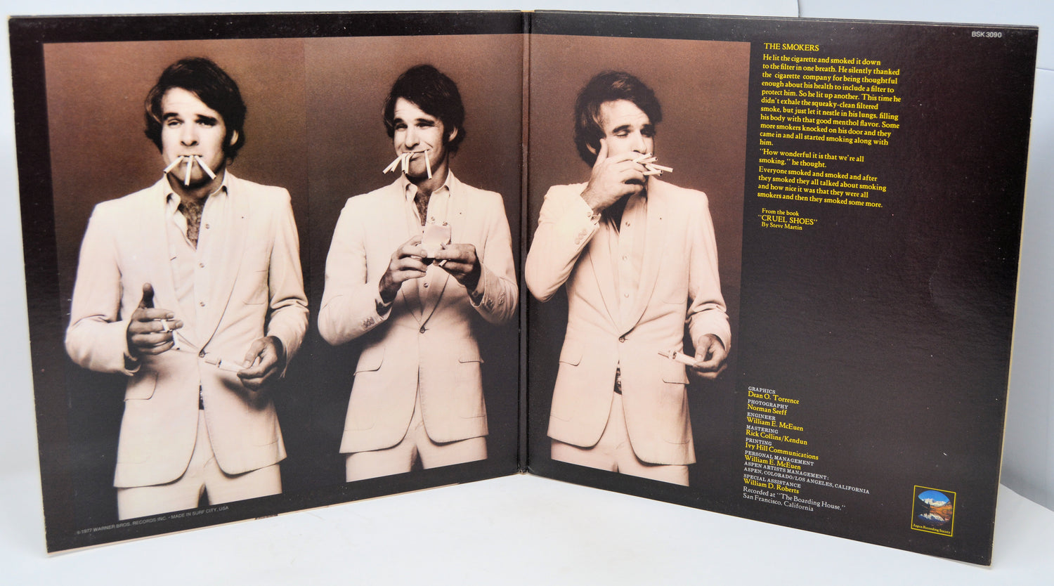 Album cover with a person smoking a cigarette, featuring text on a dark background.