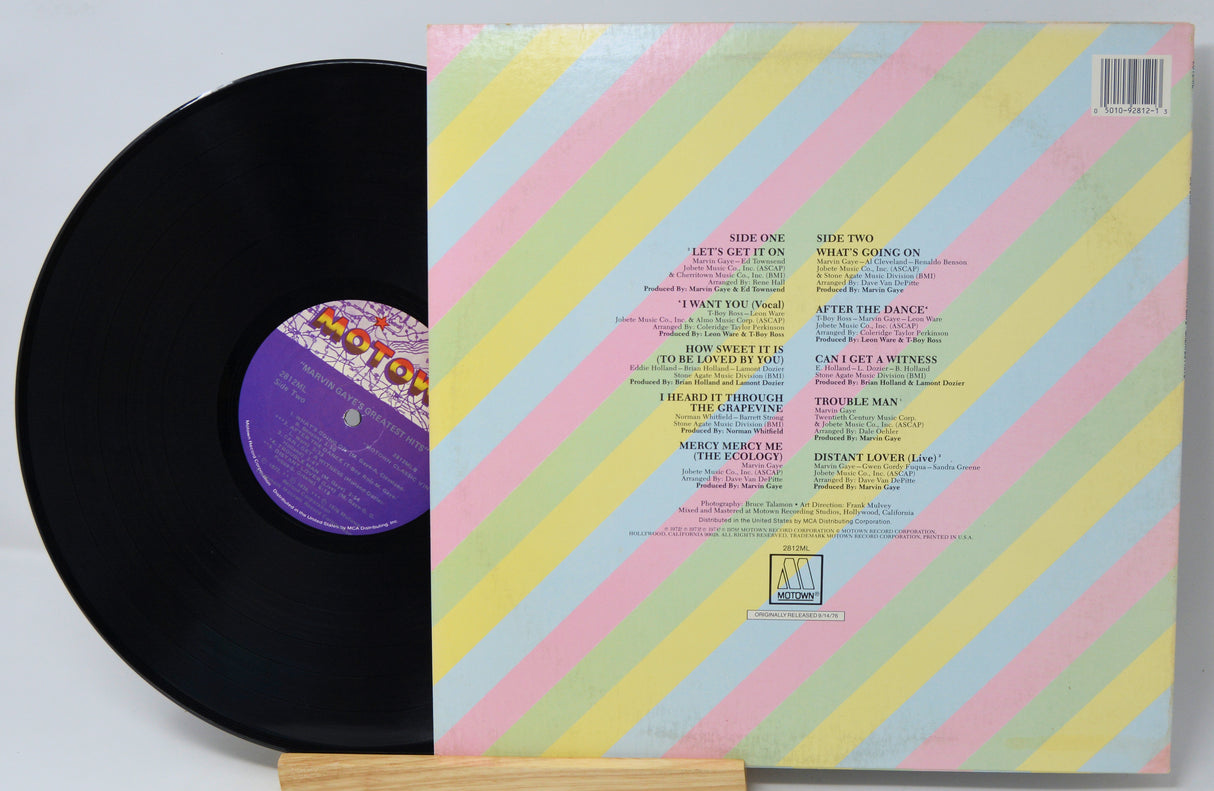 Vinyl record with colorful sleeve on a white background