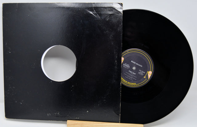 Vinyl record with a black cover on a white background