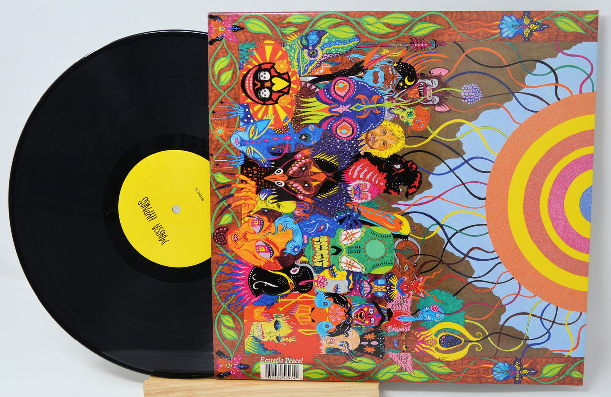 Vibrant psychedelic back cover and vinyl record of Massa Hypnos LP