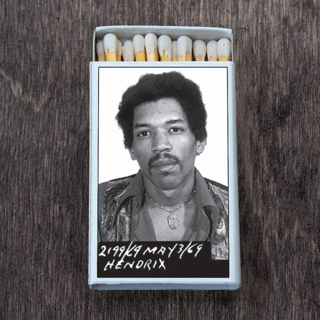 Open matchbox with iconic black and white photo of a famous musician on the cover.