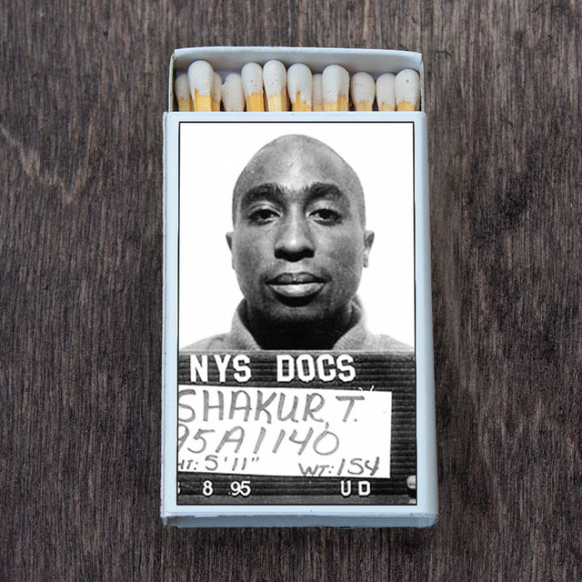 Box of matches with iconic black and white mugshot photo on the cover
