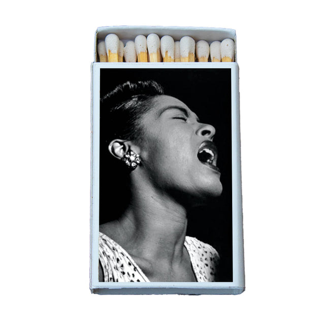 Collectible matchbox featuring a black-and-white photo of a jazz singer passionately singing