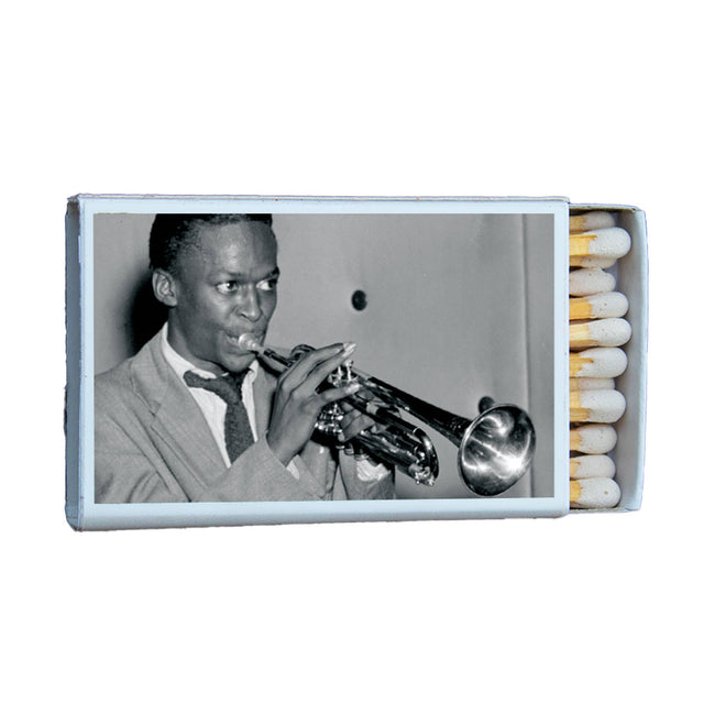 Matchbox featuring a vintage black and white photo of a trumpet player in a suit