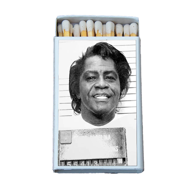 Open matchbox featuring a black and white vintage mugshot illustration on the cover