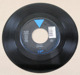 Maxi Priest Wild World 7-inch vinyl record on Virgin label, 1988 release