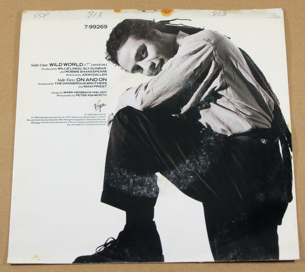 Back cover of Maxi Priest Wild World 7-inch single with black-and-white portrait
