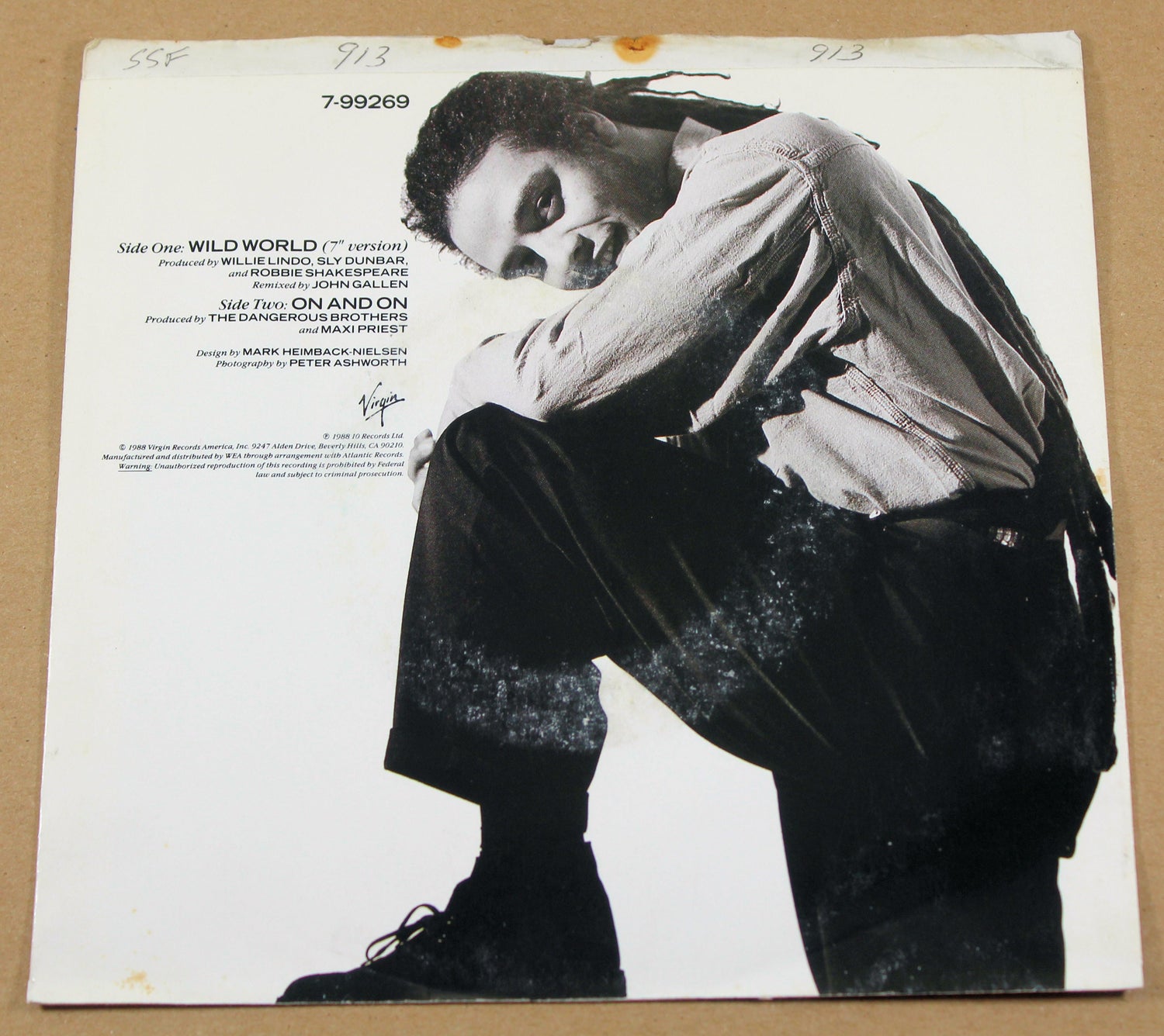 Back cover of Maxi Priest Wild World 7-inch single with black-and-white portrait