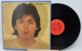 Vinyl record with cover featuring a person's face, labeled 'McCartney II'.