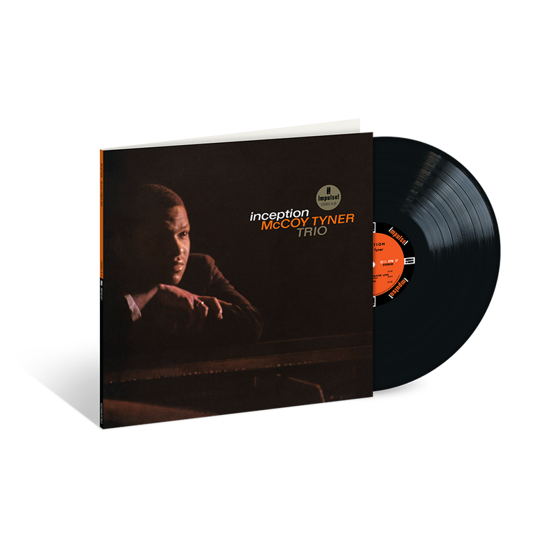 Vinyl record and cover with 'Inception' by McCoy Tyner Trio on a white background