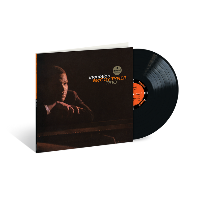 Vinyl record and cover with 'Inception' by McCoy Tyner Trio on a white background