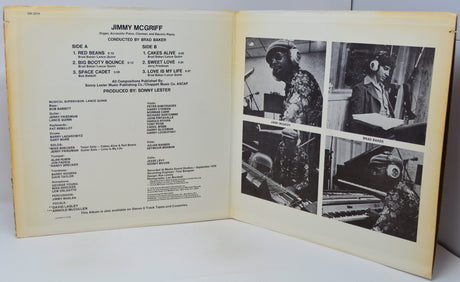 Album cover with tracklist and black and white photos of a person playing piano.