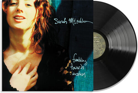 Cover art for Sarah McLachlan's album 'Fumbling Towards Ecstasy' featuring a photo of Sarah McLachlan with her hand near her throat, set against a dark background with the album title below.