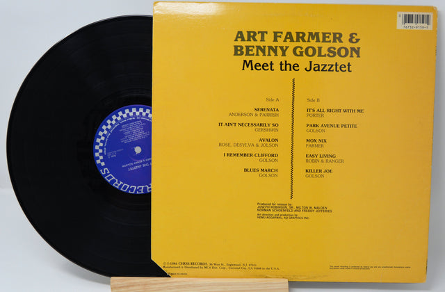 Back cover of 'Meet the Jazztet' vinyl LP by Art Farmer and Benny Golson showing tracklist and yellow design
