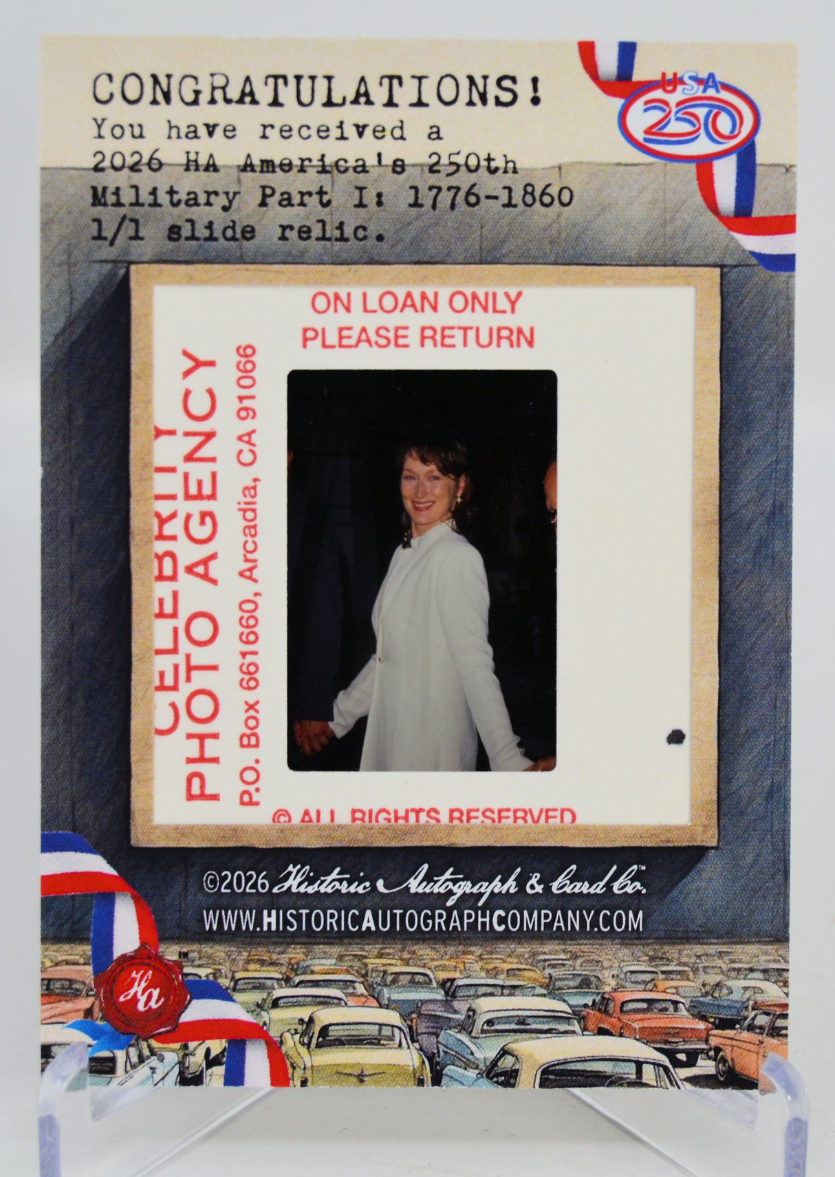 Vintage photo photo slide with Meryl Streep in a white dress and promotional text for a photo agency.