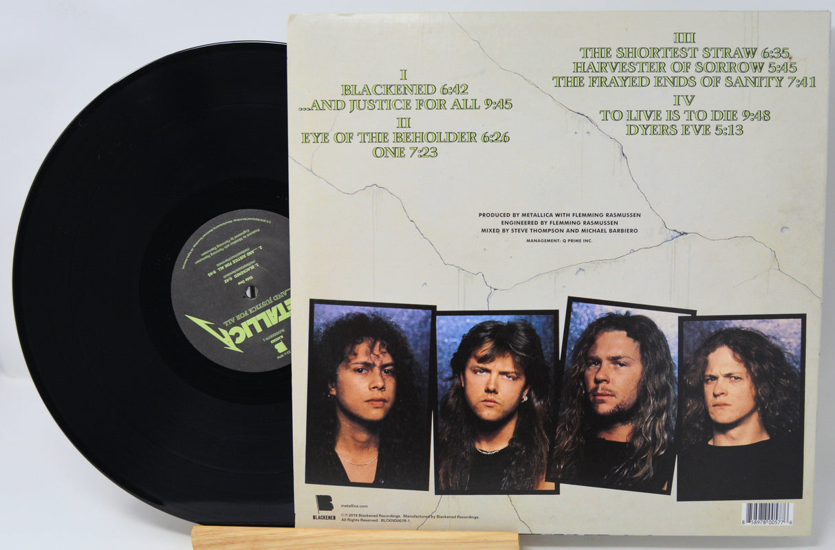 Metallica Justive for All cover featuring a the band members and track listing
