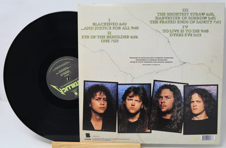 Metallica Justive for All cover featuring a the band members and track listing