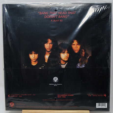 The back cover of a 1993 Warner Bros. Records vinyl record of R.