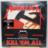 Metallica Kill 'Em All 45 RPM vinyl record sleeve, sealed in plastic shrink wrap, displayed on a small wooden stand against a white background.
