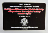 A black rectangular sticker for a 180 gram audiophile quality vinyl 2 disc set. The card features white and red text detailing the mastering and speed, along with the Warner Bros.