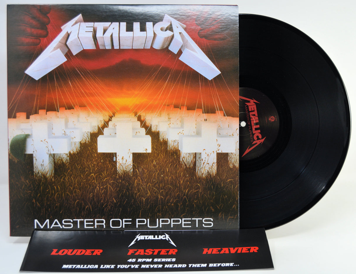 Metallica 'Master of Puppets' vinyl record package shown on a white background, including the album cover, black LP record, and a black promotional card.