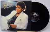 Vinyl record with 'Thriller' album cover featuring Michael Jackson