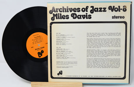 Vinyl record and cover of 'Archives of Jazz Vol. 8 Miles Davis' on a light gray background