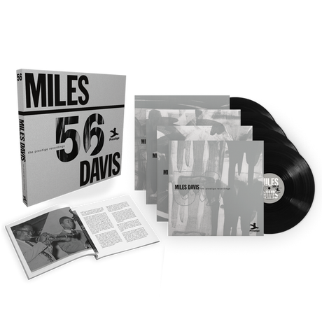 Miles Davis vinyl record set with cover and booklet on a white background
