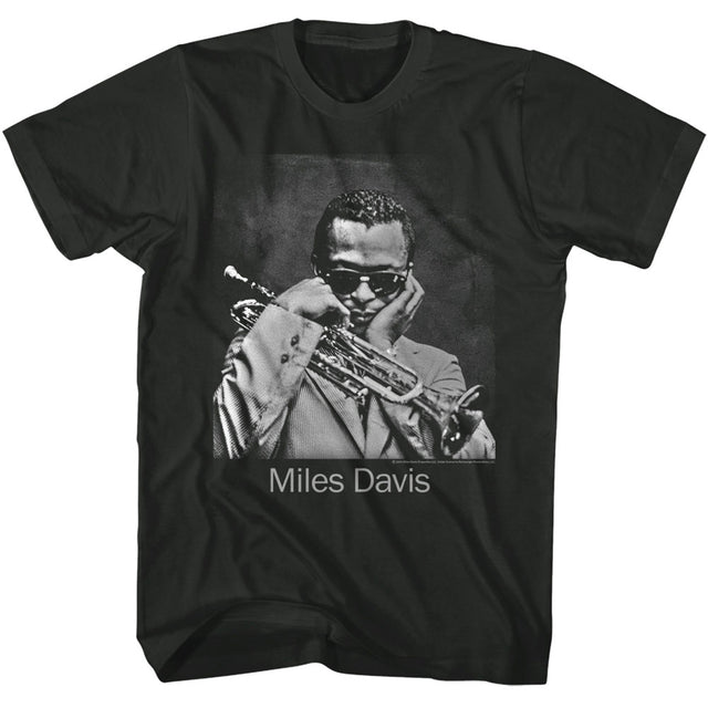 Black t-shirt with a graphic of Miles Davis playing trumpet on a white background