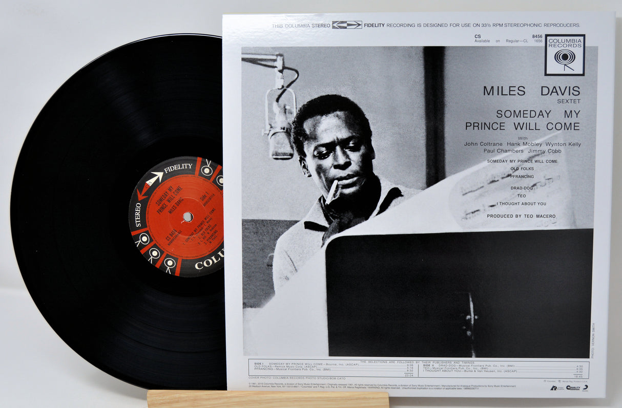A vinyl record and its album cover for Miles Davis's 'Someday My Prince Will Come' on Colortone Records, displayed on a light surface.
