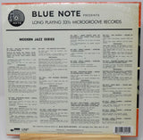 The back cover of a vinyl record sleeve for Blue Note Records' 'Modern Jazz Series', featuring track listings, barcode, and UM Music branding on an off-white background with orange border accents.