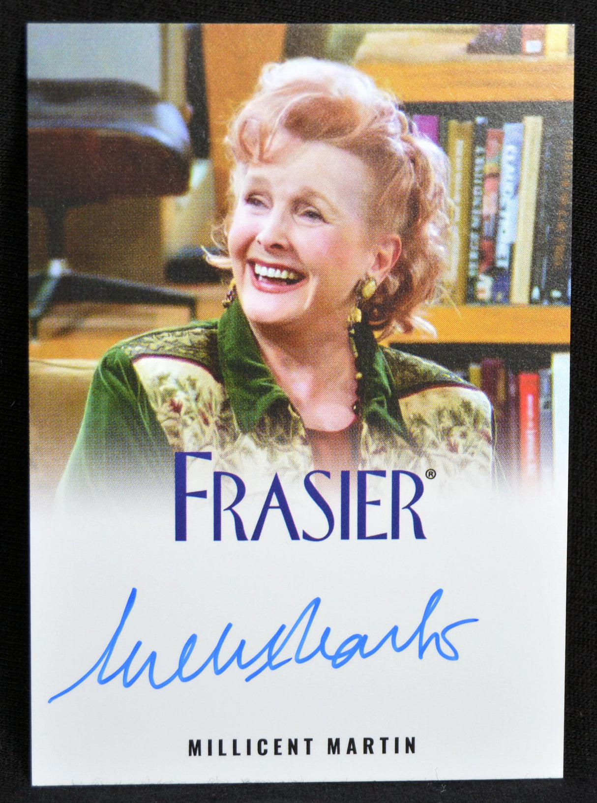 Trading card of Millicent Martin from the TV show 'Frasier' with a signature and character name.