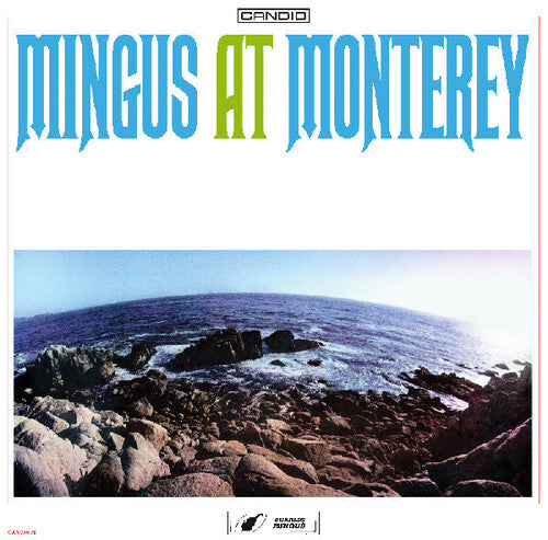 Album cover for 'Mingus At Monterey' featuring a photograph of a coastal scene with rocks and water.