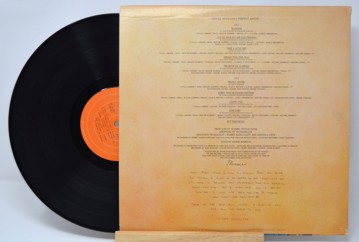 'Minnie Riperton Perfect Angel' Vinyl record with its cover displaying text on a light gray background