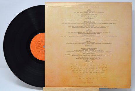 'Minnie Riperton Perfect Angel' Vinyl record with its cover displaying text on a light gray background