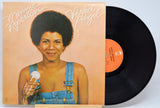 Vinyl record by 'Minnie Riperton with a cover featuring her with a melting ice cream cone and the title 'Perfect Angel'. 