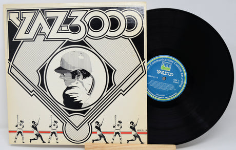 Vinyl record with cover featuring a stylized illustration of a person and baseball players, on a white background.