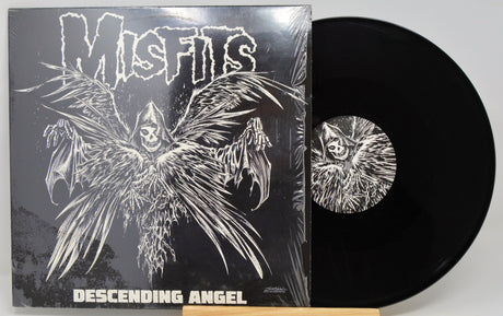 Vinyl record with 'Misfits Descending Angel' cover featuring a bat and skull design.