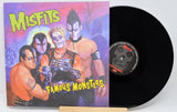 Vinyl record with 'Misfits Famous Monsters' cover featuring illustrated characters.