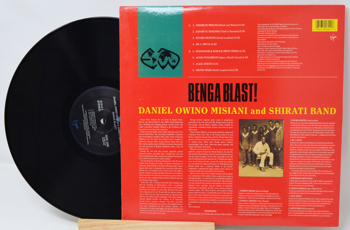 Vinyl record with cover featuring a black and white photo of a person playing a flute.