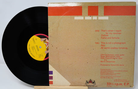 Vinyl record with a yellow label and its cover on a white background